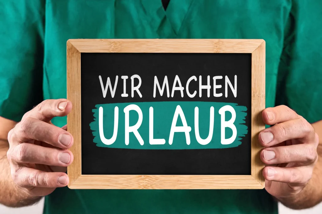 Arzt Urlaub – Schild mit Wir machen Urlaub
