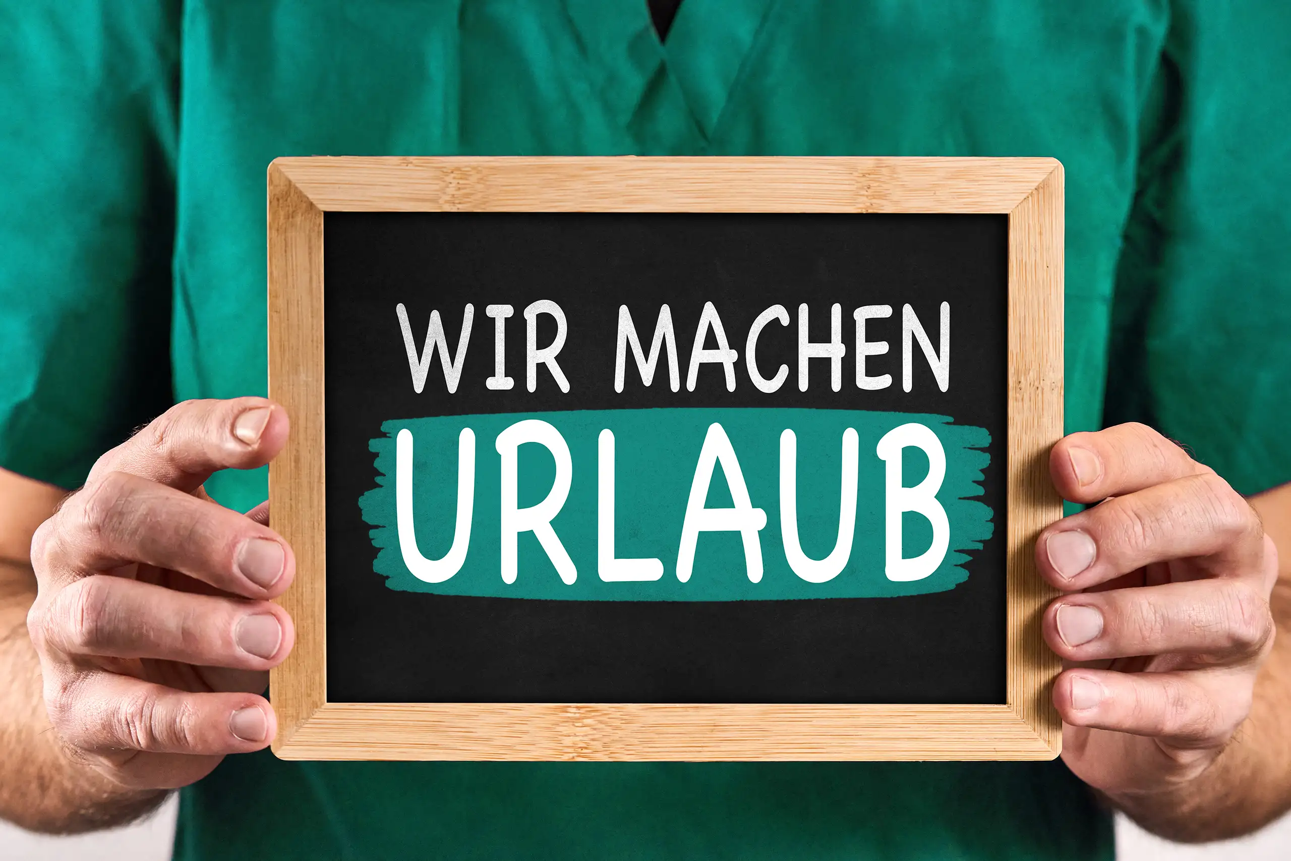 arzt urlaub – schild mit wir machen urlaub