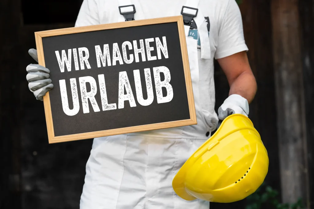 Bauarbeiter Urlaub – Schild mit Wir machen Urlaub