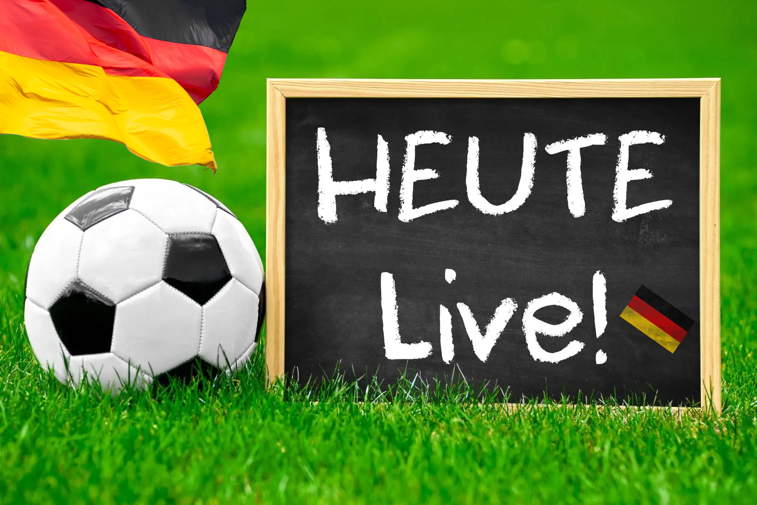 fußball mit deutschland fahne und hinweisschild für deutschland fußball heute live.