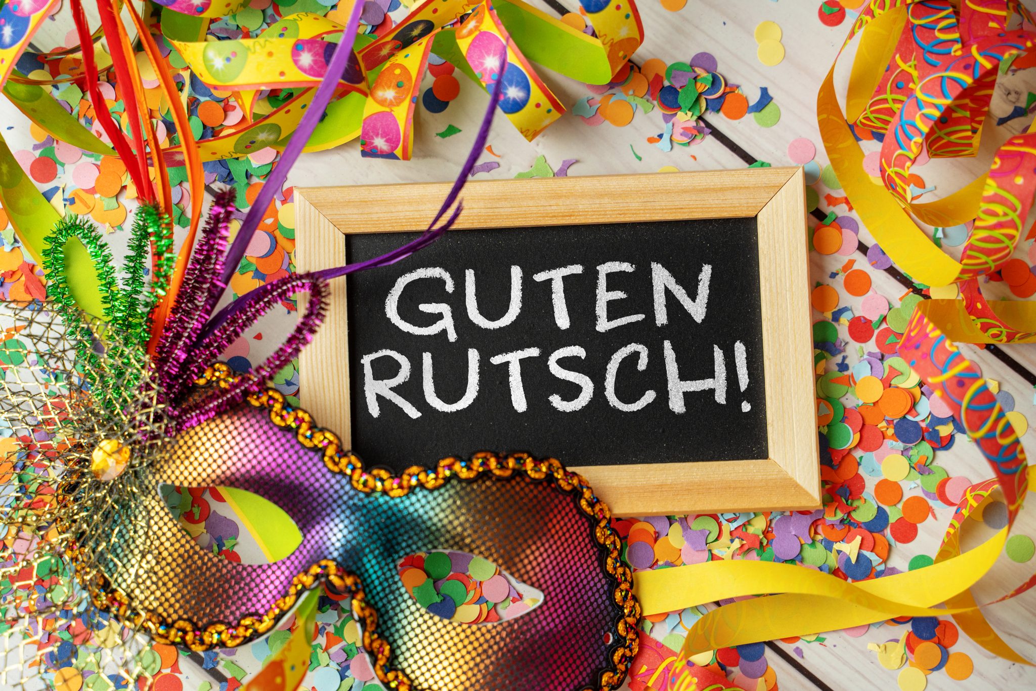 guten rutsch! silvestergruß mit luftschlangen