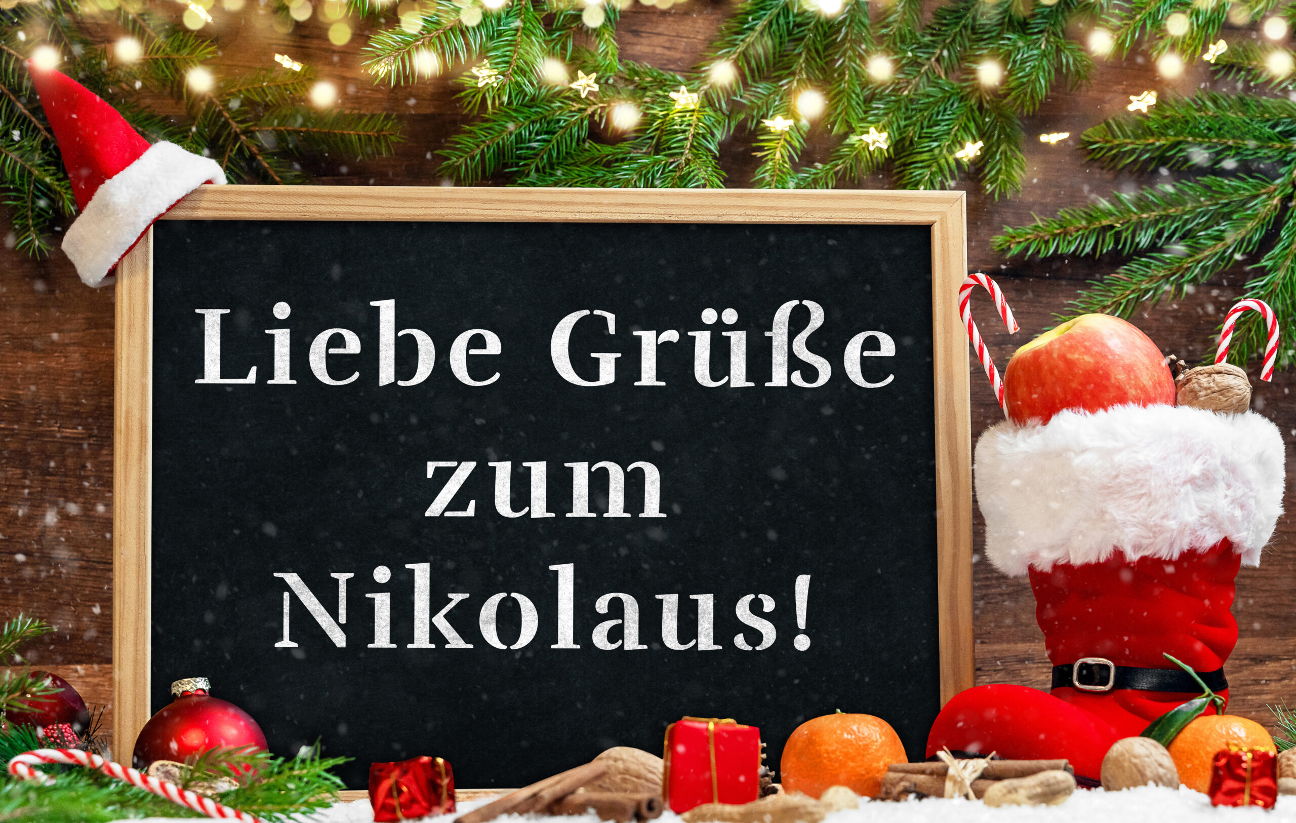 liebe grüße zum nikolaus – festlicher nikolausgruß mit tafel, nikolausstiefel, apfel, nüssen und winterlicher deko