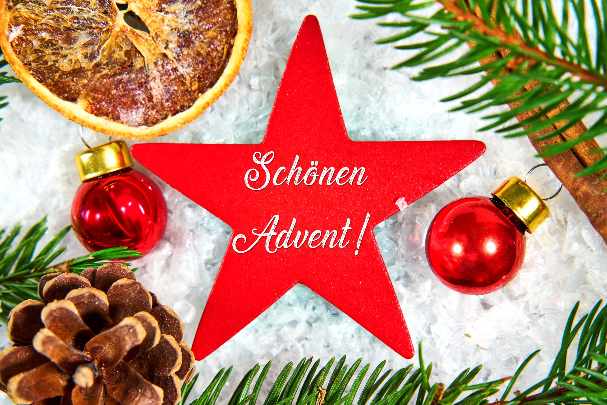 schönen advent, grüße auf einem roten stern