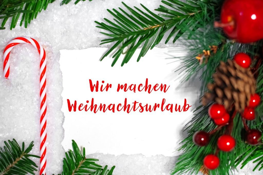 Wir machen Weihnachtsurlaub roter Schriftzug